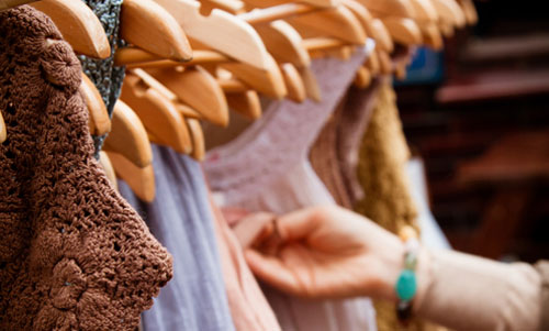 rack with dresses on hangers
